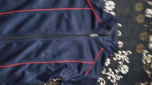 Blue Jacket with Red Stripes