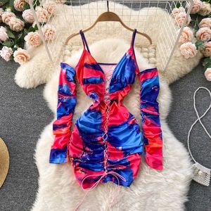 vibrant ruched bodycon dress with a tie-dye print