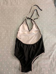 Black halter swimsuit w/crochet detail