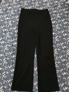 Tourser Pants With Little Flare At The Bottom