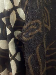 Brown 40 size Kurti with sequence work on neck