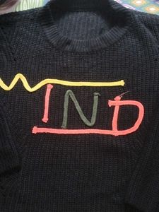 Black &#34;WIND&#34; Knit Sweater