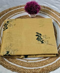 Elegant Beige Embroidered Saree