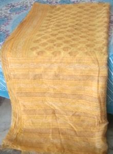 yellow printed saree attached fall
