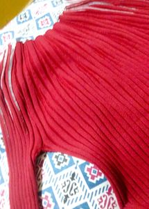 Red embellished long sleeve top