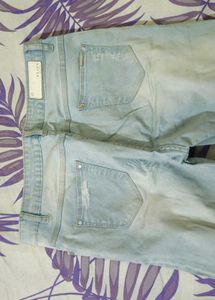 Ice Blue Colour Ripped Jeans