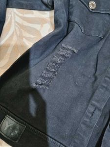 Distressed Denim Jacket