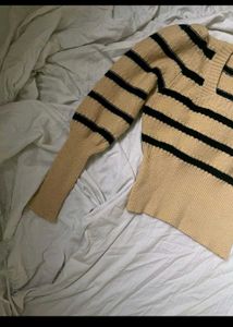 Its a Honeycomb Sweater With Yellow Black Straps