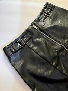 Zip-Up Leather Skirt With WaistBuckle Embelishment