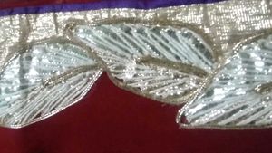 Elegant Maroon Saree with Silver Details