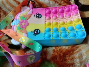 Combo Set Of Cute Unicorn Popit Bag Unicorn Coloured Shirt And Hair Clip