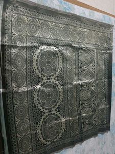 Greyish coloured saree