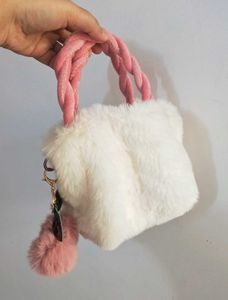 Plush Pink Handbag with Charm