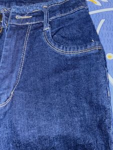 Ripped Dark Blue Denim Jeans