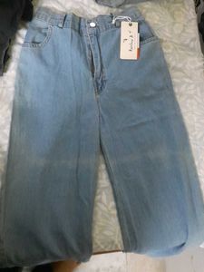 Light Wash Wide Leg Jeans With A Slit