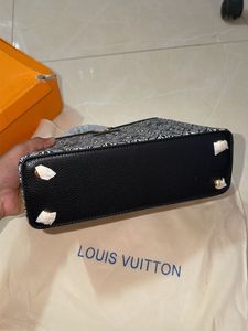 Louis Vuitton Capucine Handbag with sling belt