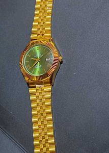 Rolex Golden Watch with green dial without box or