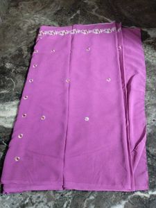 Saree with maching Blouse.