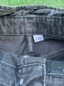 Black belted denim shorts