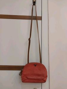 Baggit Leather sling Bag Coral Color With 2 Compar