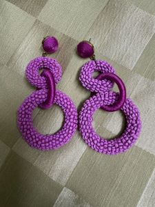 Purple/ mauve dangling earrings