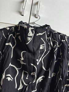 Abstract Face Print Top