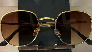 Gold Frame Oval Sunglasses