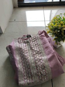 Lavender Kurti With Work In Yoke And Hand Part