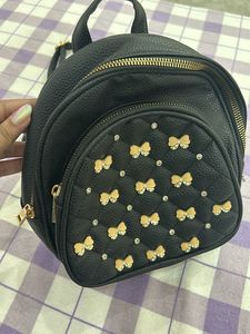 Black Sling Backpack