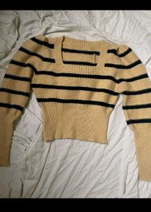 Its a Honeycomb Sweater With Yellow Black Straps