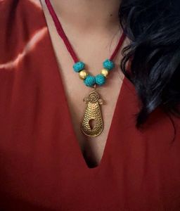 Beaded Thread Necklace With Brass Pendant