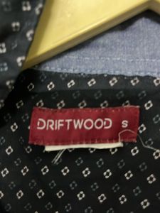 Black With Little Design On The Shirt