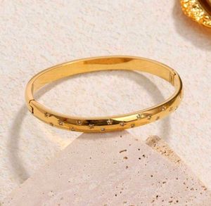 Star studded bangle bracelet