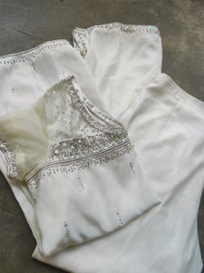 A White Short Kurti With Straight Pent