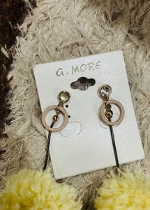Thread pom pom earring