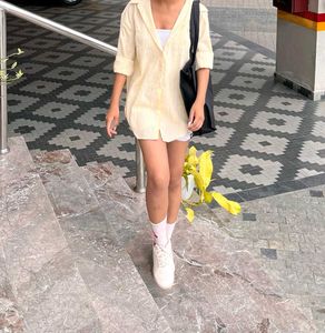trendy yellow shirt