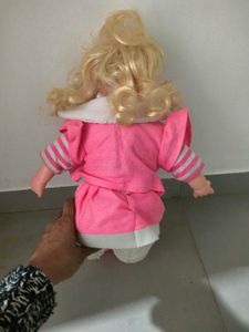 Singing Doll in Pink Outfit