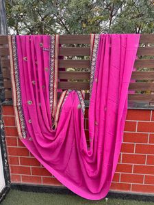 Rani Pink Saree With Embellished Border And Blouse