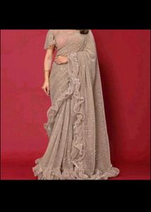 New Ruffle pallu saree with stitched blouse