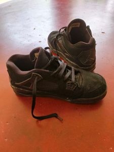 Air Jordan 4 Retro “Black Cat”
