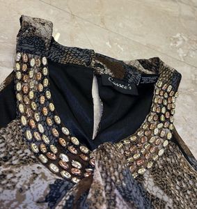 Brown A-line dress with neck embellishments