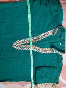 Dark green cotton kurta ...three quarters sleeves...beautiful neck line...no flaws..