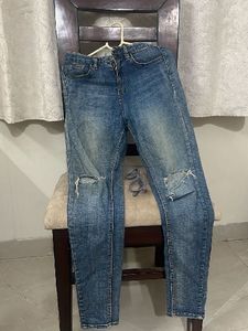 Ripped Knee Denim Jeans