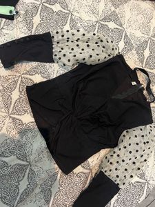 Stylish Black Top w/ Polka Dot Sleeves