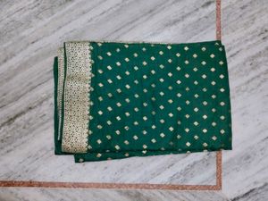Green Saree with Gold Accents