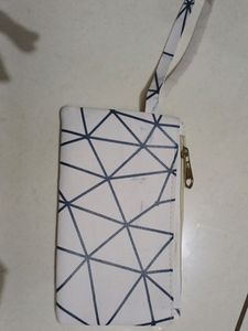 White Purse With Black Stripes And Handle , Length : 19cm , Width: 12 Cm