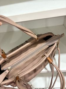 Woven Handbag with Tassels