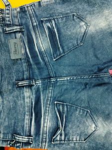 Distressed High-Waisted Denim Jeans