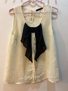 Formal Cream Sleeveless Top with Black Bow