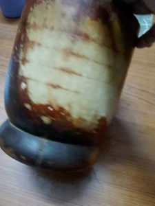 Wooden okhli